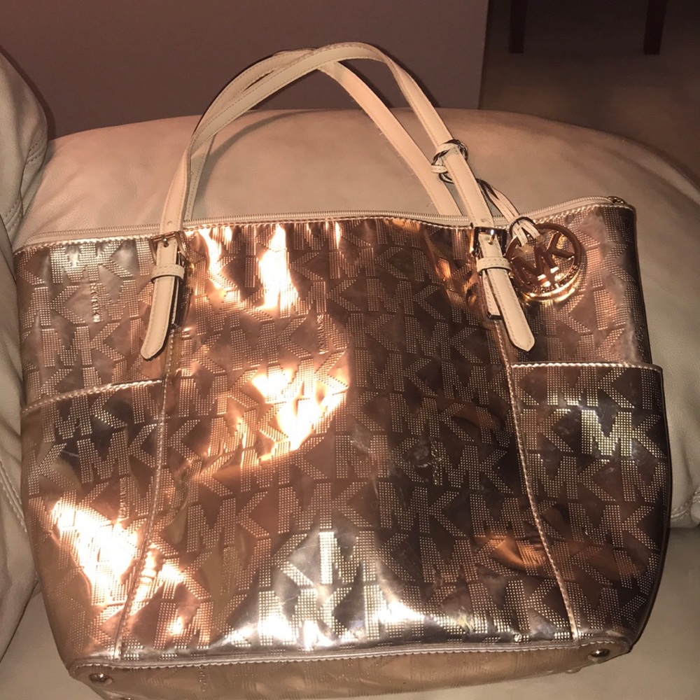 Rose gold MK purse